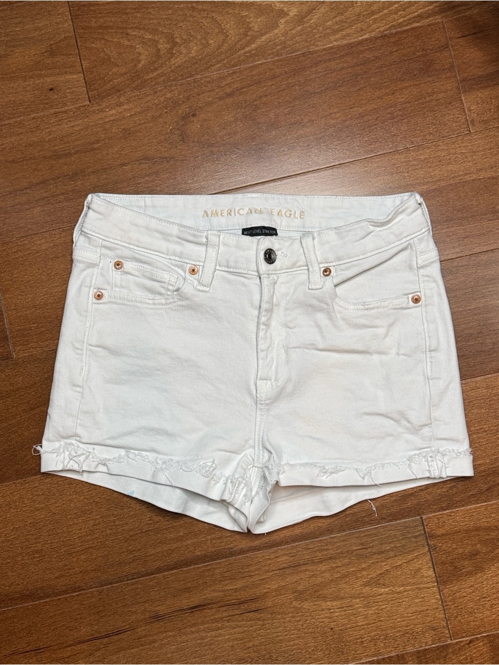 AMERICAN EAGLE High V-Rise White Frayed Denim Shorts